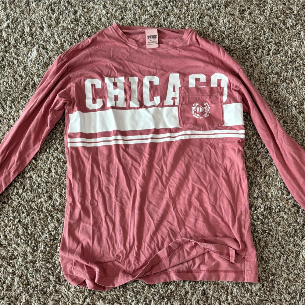 PINK long sleeve shirt.